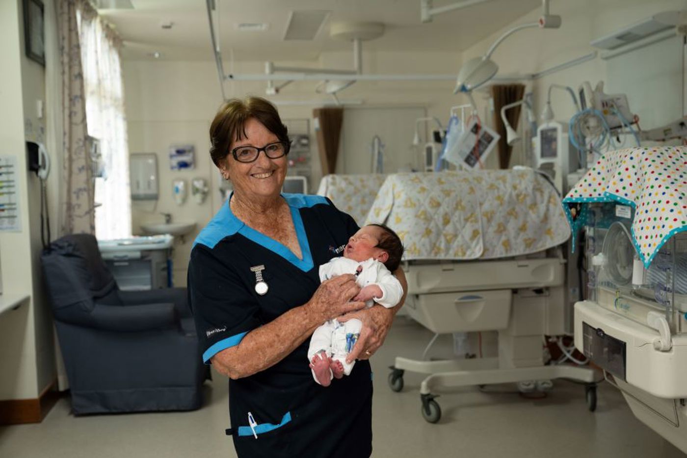 Nurse Janet Ezzy with baby